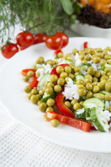 Risotto with fresh cucumber, radishes, pepper and green peas