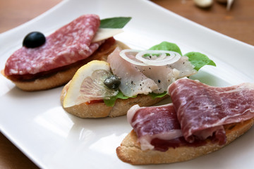 Tasty homemade tapas with different fillings on the table