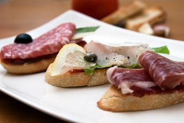 Tasty homemade tapas with different fillings on the table