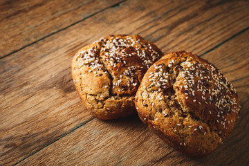 Freshly baked homemade bread on rustic wood background