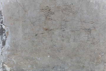 Shabby old concrete wall with scratches