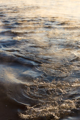 Water vapor on surface of cold water