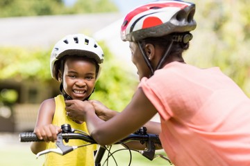 Happy family wearing a helmet