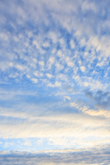 Calm sunset clouds and blue sky