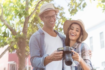 Young couple looking in camera