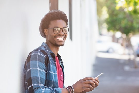 Young Man Using Mobile Phone