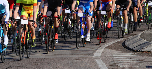 Fototapeta na wymiar cyclists with fast race bike during the cycling race on asphalt