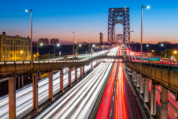 Rush hour traffic with light trails on George Washington Bridge, in New York City