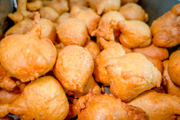 Golden fried doughs ready to serve, traditional food on Ecuador