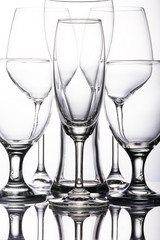 Empty glasses on white background
