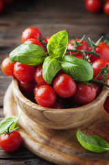 Concept of vegetarian healthy food with tomato and basil