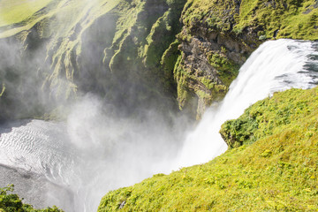 Beautiful Skogafoss waterfall, view from the top. Iceland.