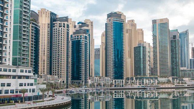 View of Dubai Marina Towers in Dubai at morning time timelapse