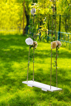 teeterboard, teeter-totter, flip-flap in the garden