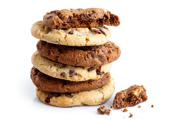 Stack of light and dark chocolate chip cookies isolated. One bro - obrazy, fototapety, plakaty