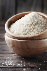 Brown sweet sugar on the wooden table