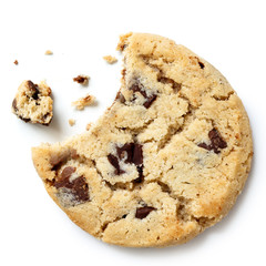 Light chocolate chip cookie, bite missing with crumbs from above - obrazy, fototapety, plakaty
