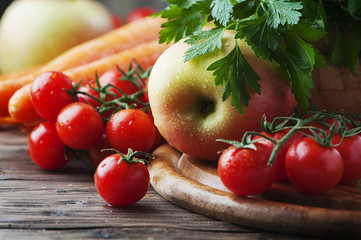 Concept of healthy food with tomato and apple