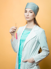 Female scientist with flask