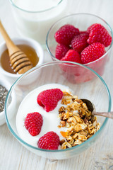 healthy snack - granola on wooden surface