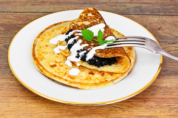 Pancakes with Black Caviar