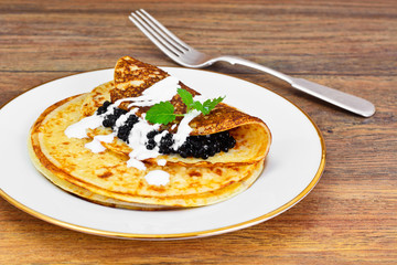 Pancakes with Black Caviar