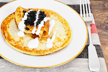 Pancakes with Black Caviar