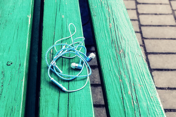 Headphones lying on the bench