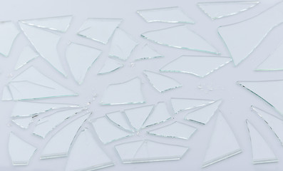 Broken glass, cracked glass on white