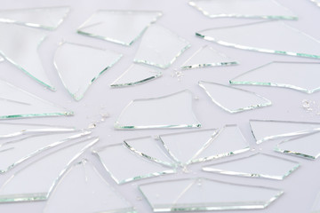 Broken glass, cracked glass on white