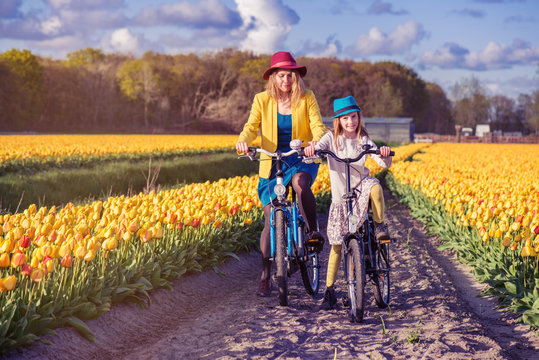 Mom and daughter riding bikes