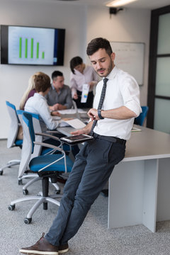 young business man with tablet at office meeting room