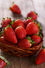 Strawberries in rustic basket