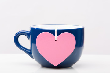 Blue cup with pink heart