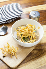 Fried noodle in Gravy on wooden background
