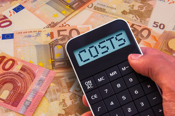 Calculator with the word Costs on the display