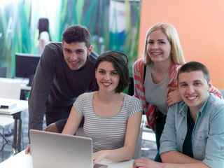 group of students study together in classroom