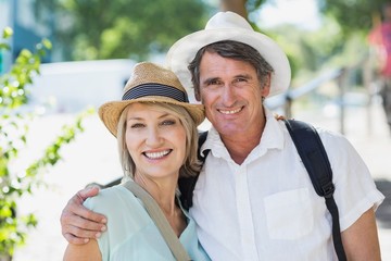 Portrait of happy couple on city break