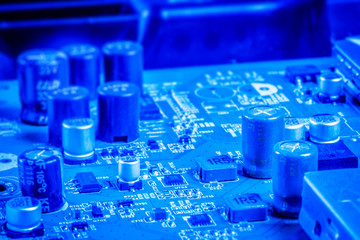 Electronic capacitors and chips on a microboard