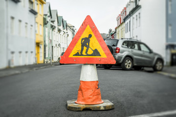Roadwork sign on a cone