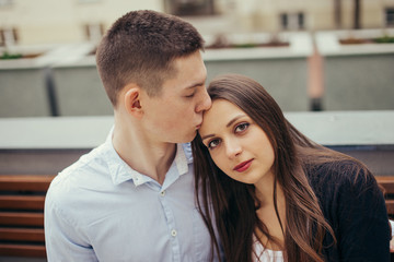 Lovely couple sitting in the park background