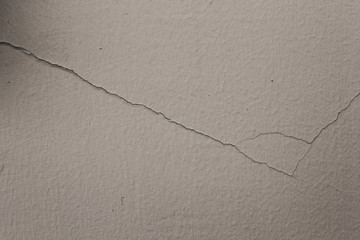 cracked on a gray cement background