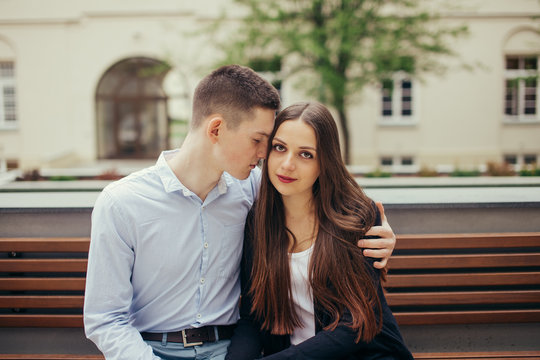 Lovely couple sitting in the park background