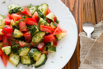 vegetarian salad with olive oil and tomato cucumber