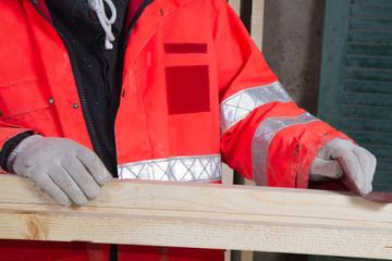 carpenter at work in a building site