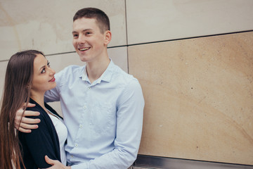 Lovely couple hugging on the street