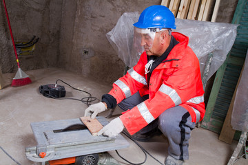 carpenter at work in a building site
