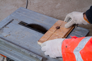 carpenter at work in a building site