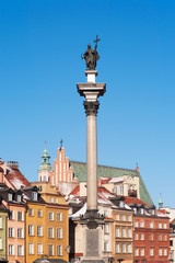 Fototapeta na wymiar Sigismund's Column (Kolumna Zygmunta) in Castle Square, Warsaw, Poland. The statue erected in 1644 commemorates King Sigismund III Vasa, who in 1596 moved Polish capital from Cracow to Warsaw