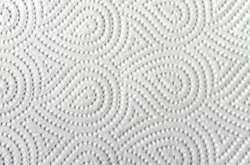 White paper towel.Close-up view of ornamented paper napkin  texture background.
